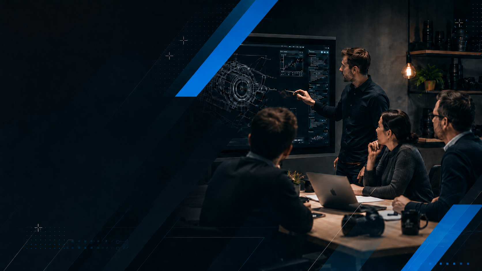 Professional engineer presenting a technical briefing to a small team in a modern conference room with laptops, presentation screens, and blue corporate design elements.