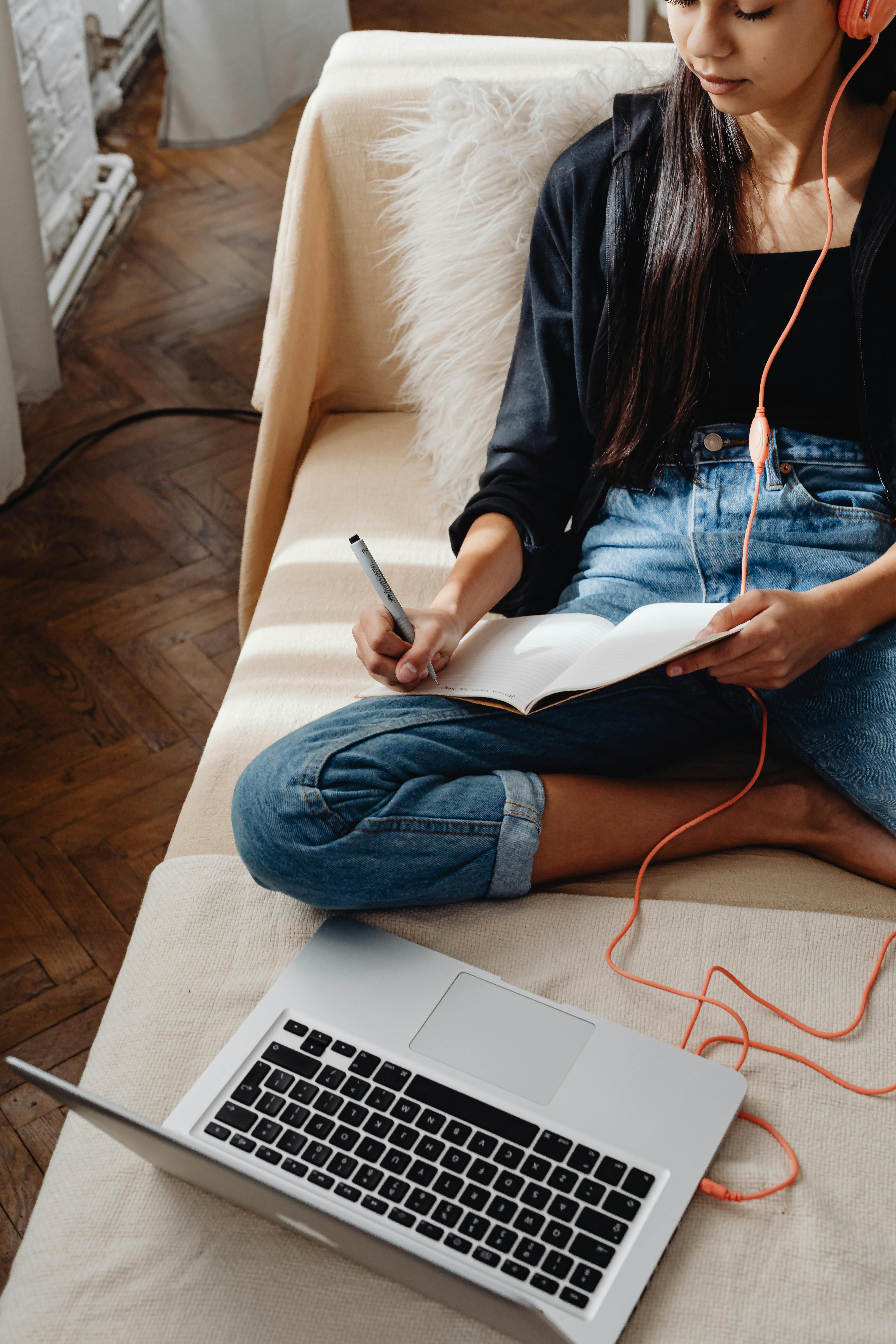 Photo by    www.kaboompics.com: https://www.pexels.com/photo/student-writing-on-a-notebook-7283637/