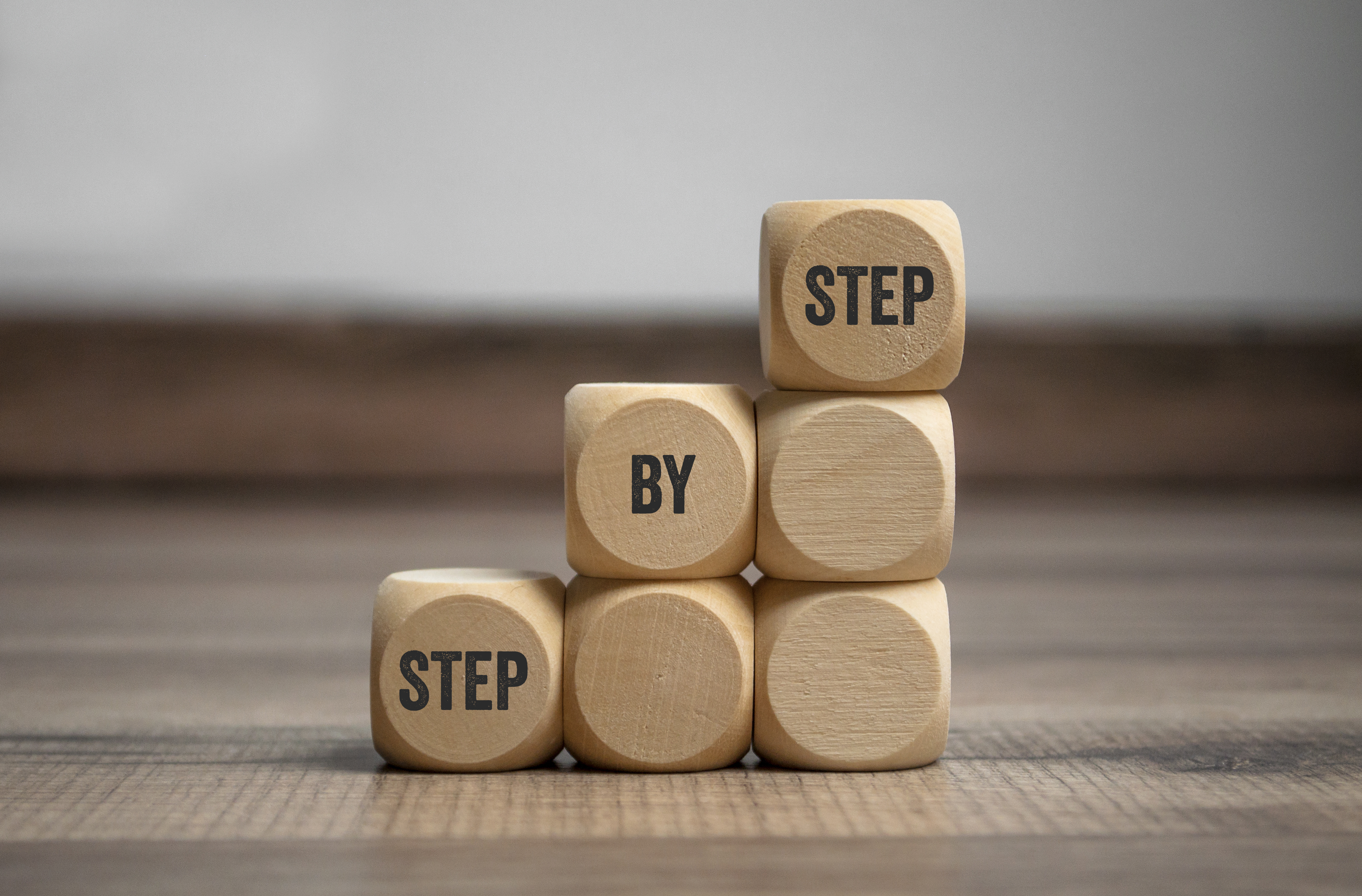 Building blocks arranged as a staircase to symbolize the step by step approached used by Test Crushers to explain these difficult course concepts.