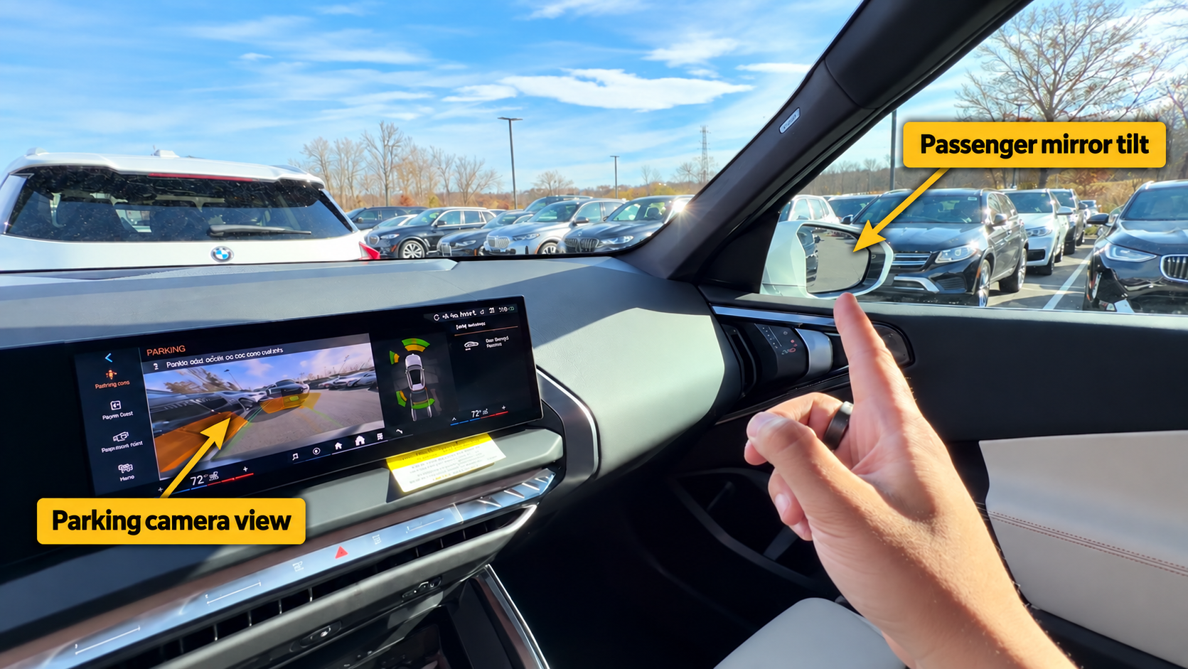 Annotated BeamerView course frame showing passenger mirror tilt and the parking-camera view, from the Driver’s Door Controls  Mirrors lesson.