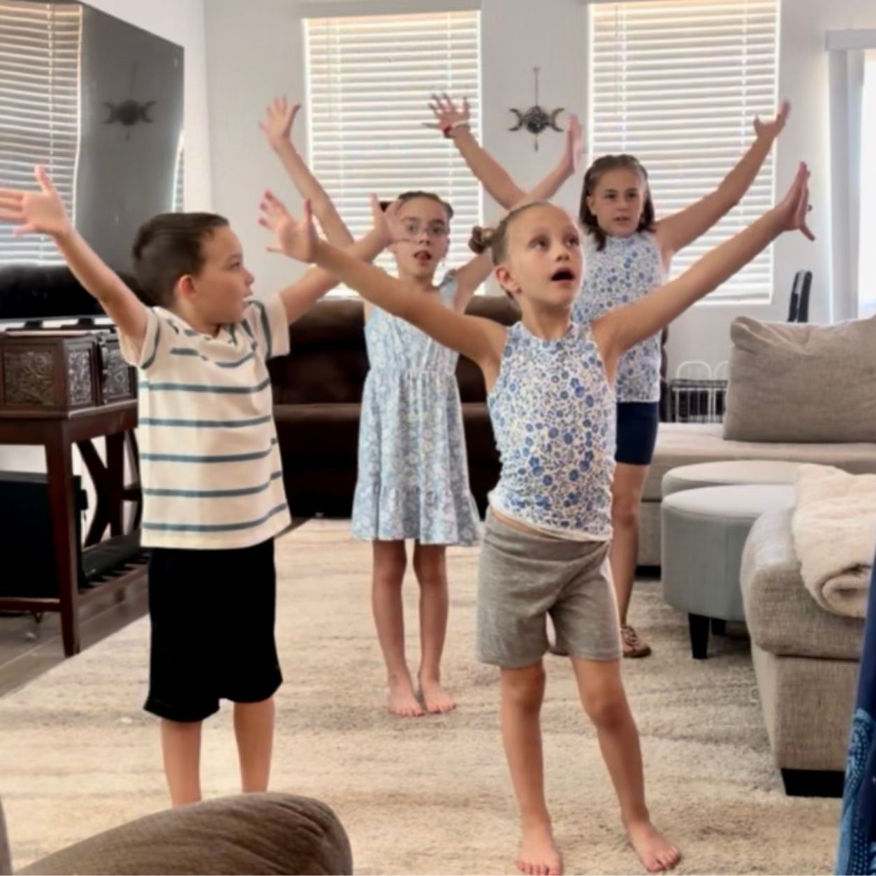 Children practicing breathing exercises. 