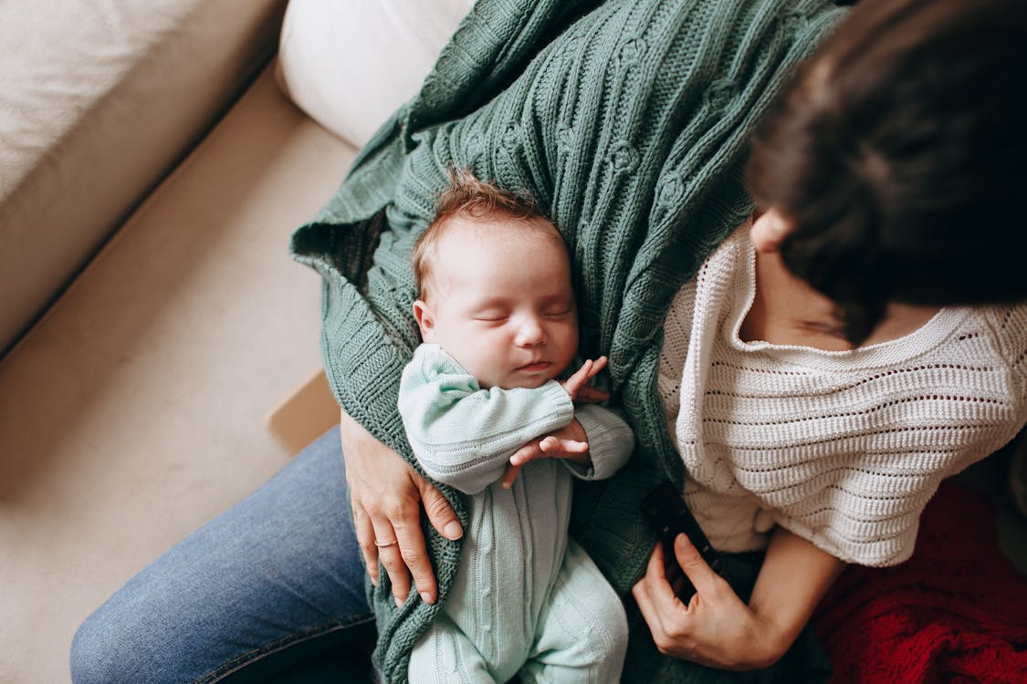woman holding baby