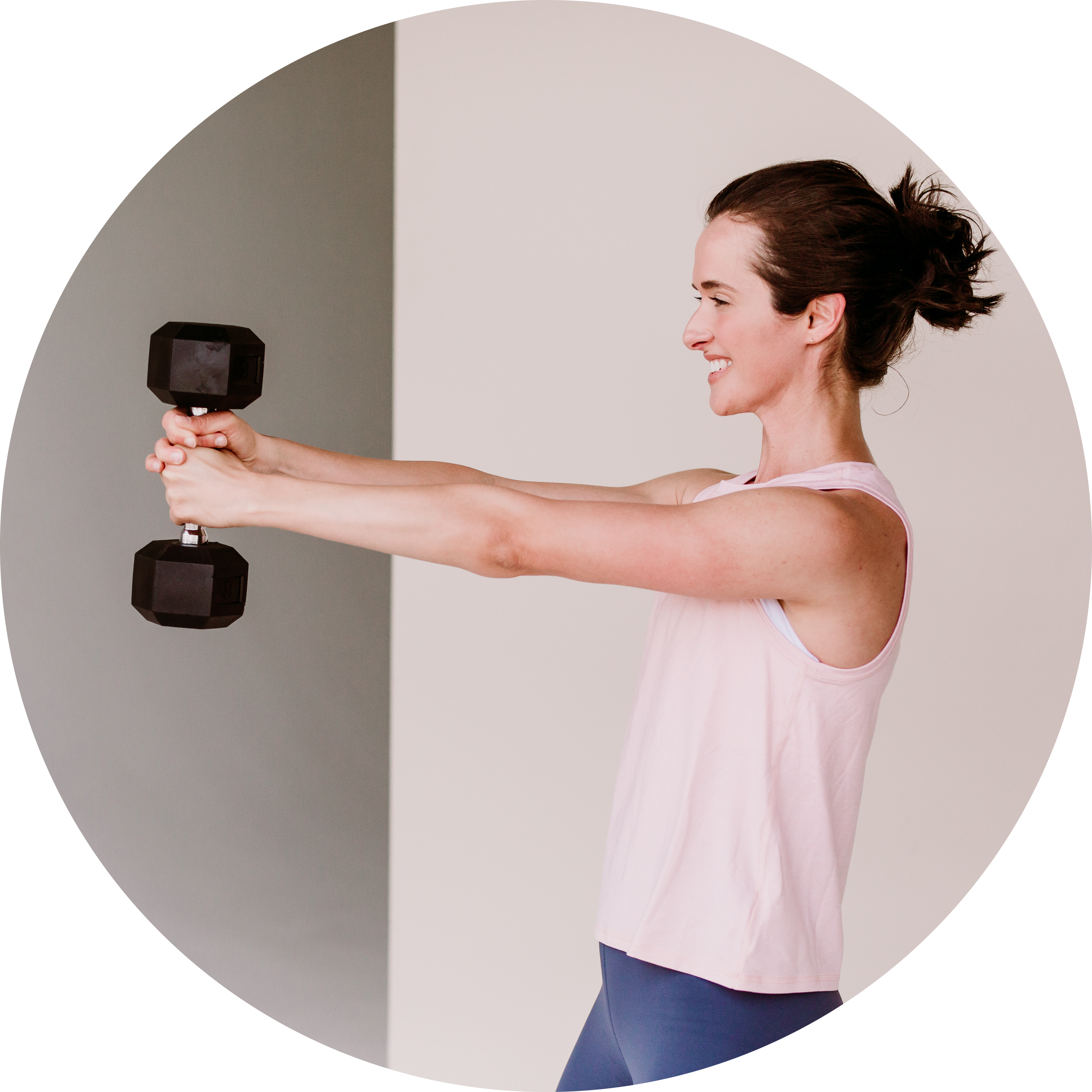 woman exercising with dumbbell