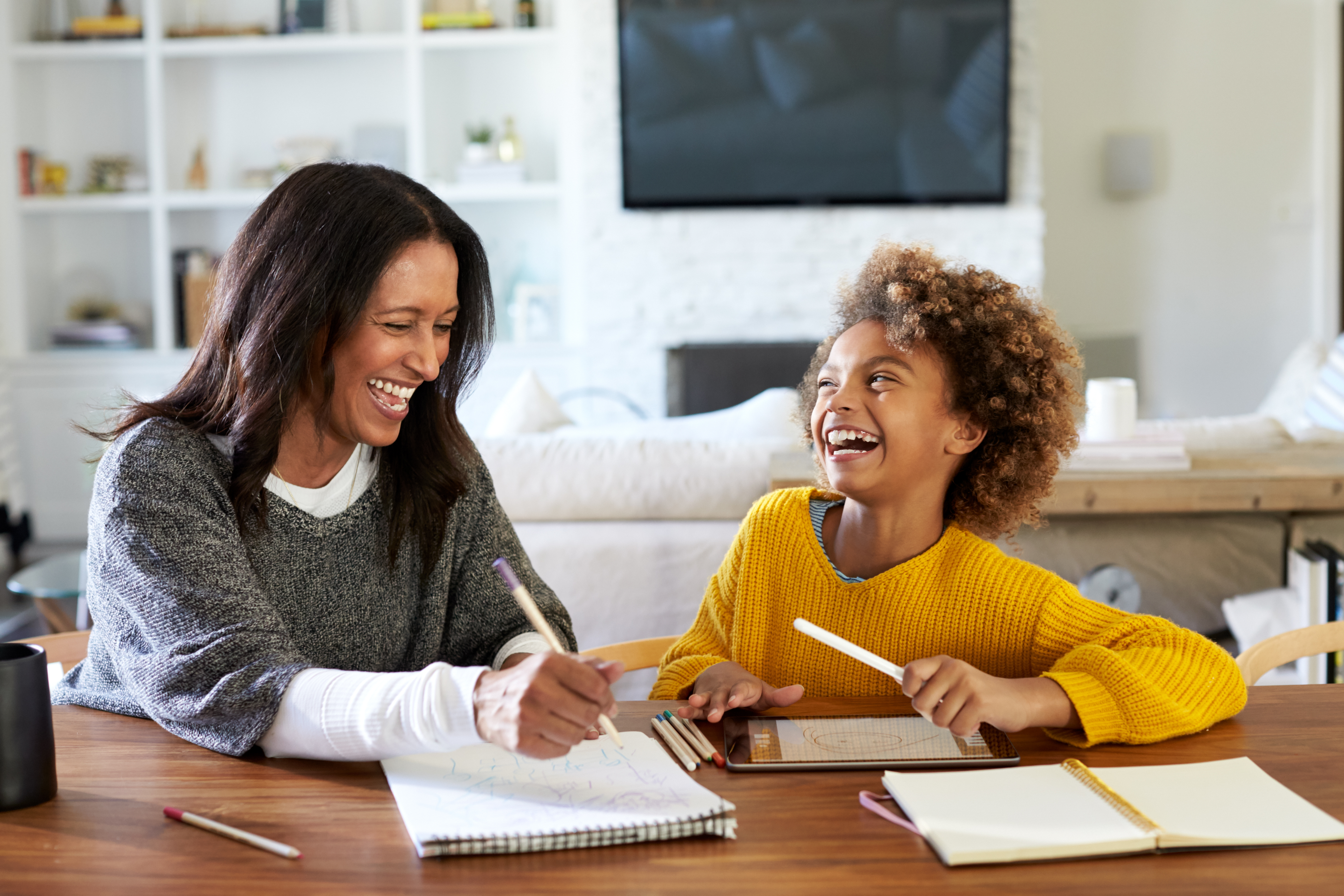 mom doing homework with child