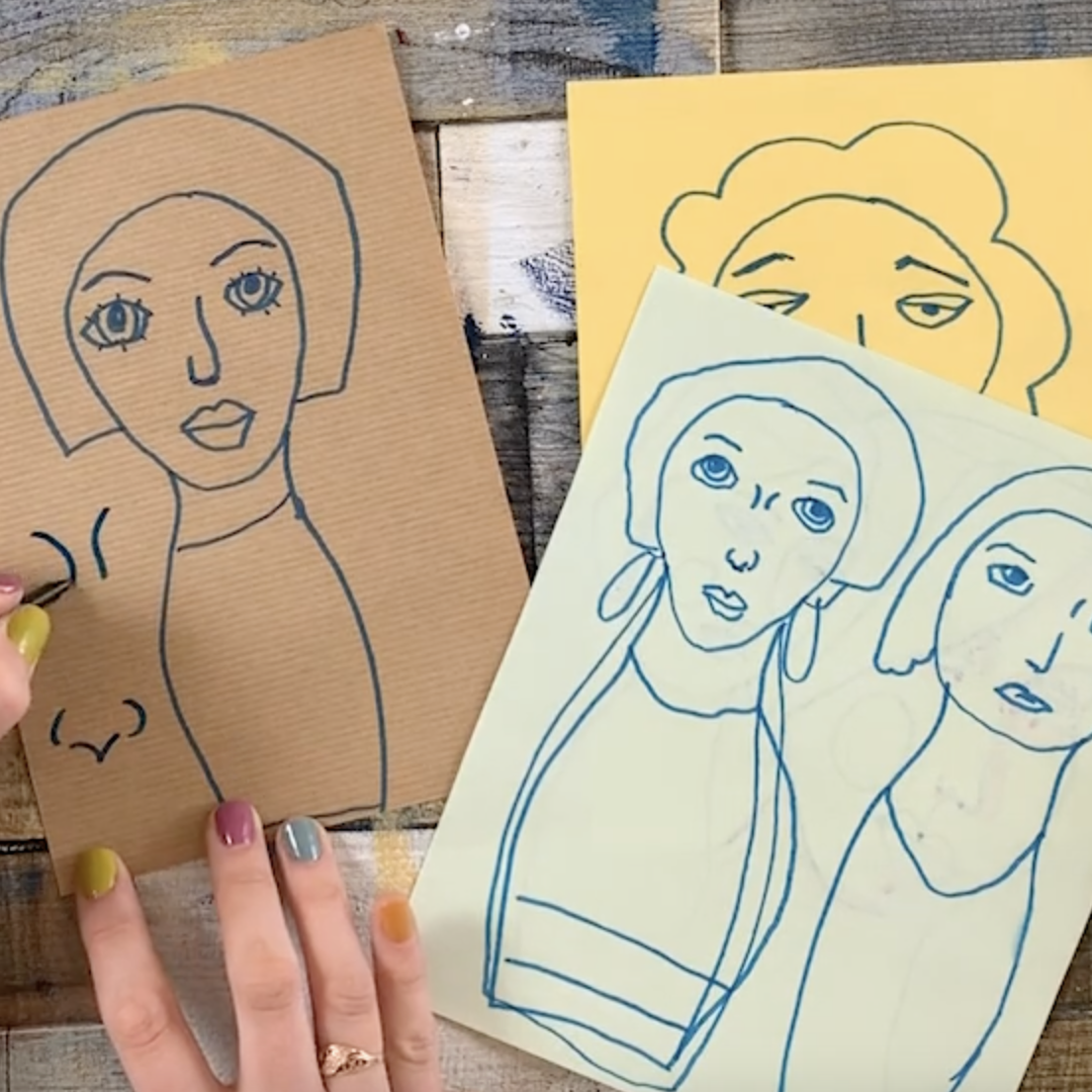 Abstract figures with different expressions, hair, and features
