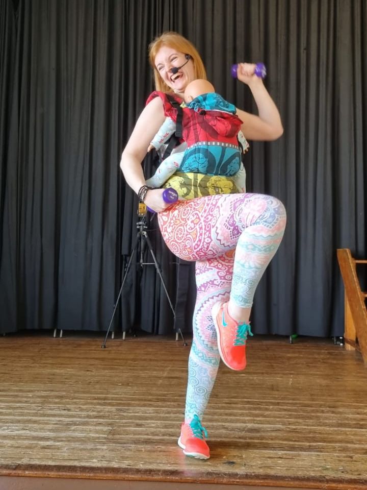 Karen Ellis, Babywearing exercise expert instructor teaching a postnatal fitness class