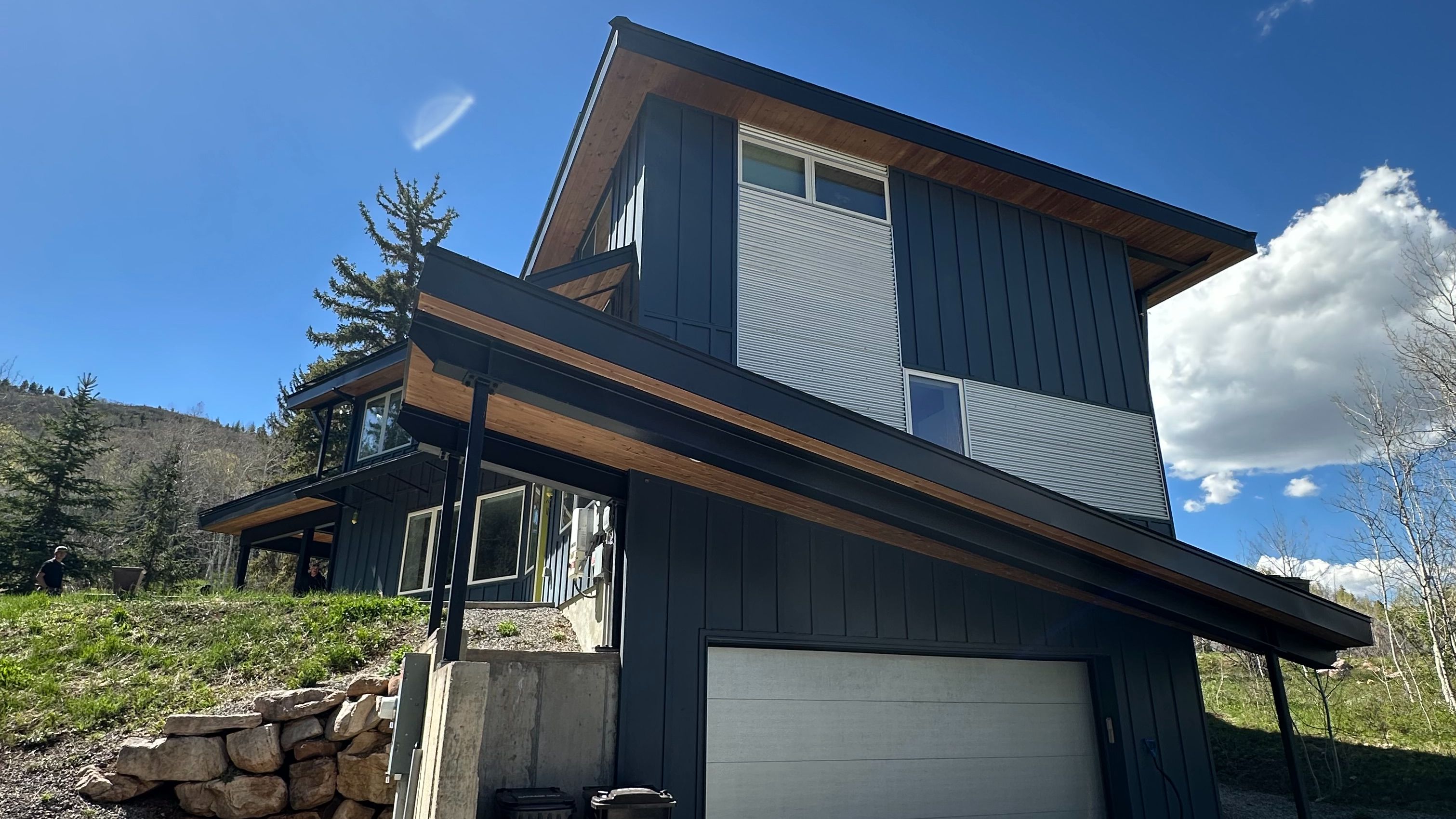 Modern house construction with flat and pitched roof sections and good defensible space in Park City, Utah. Photo by J. McAdams.