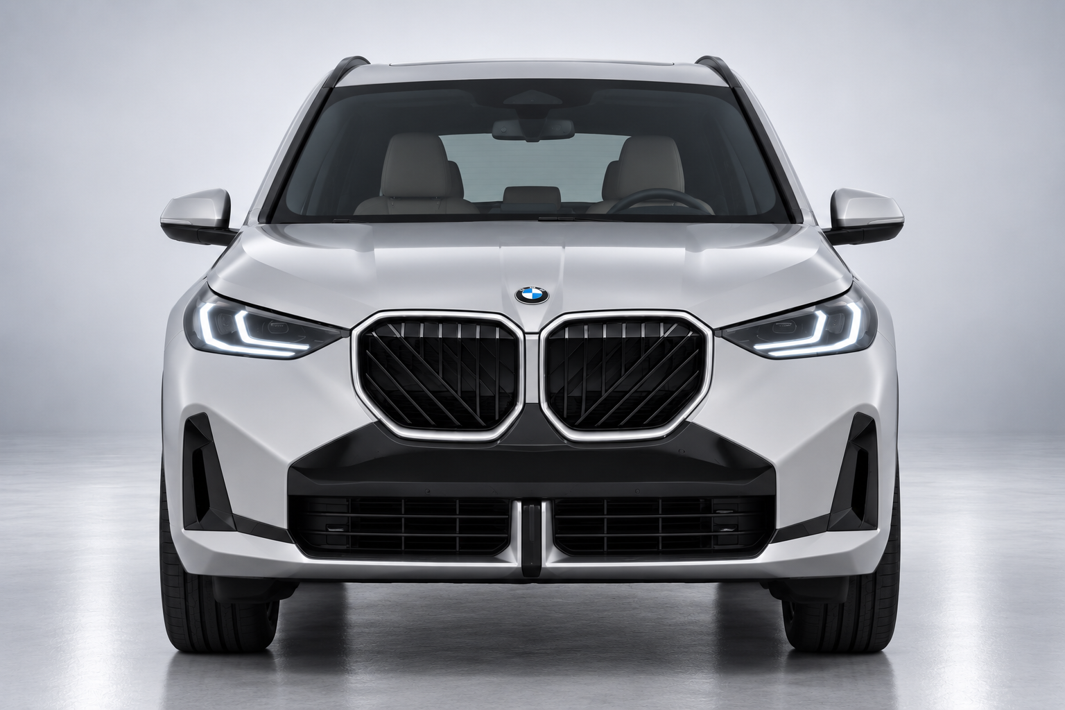 Front view of a white 2025โ2026 BMW X3