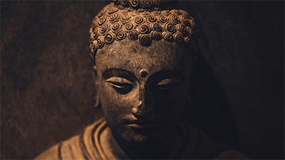 Statue of a meditator, possibly the Buddha, in deep meditation
