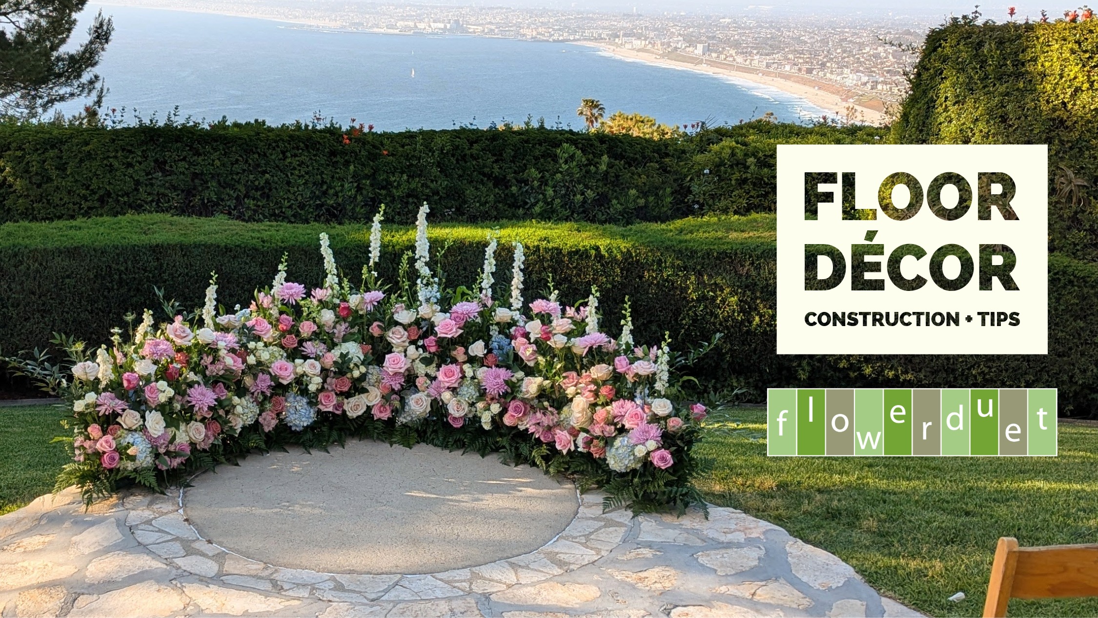 Elegant wedding floor decor flowers with ocean background