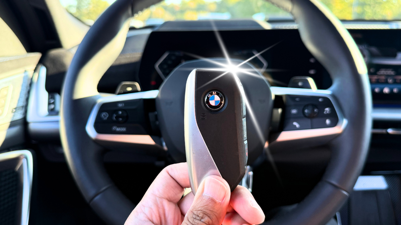 X3 key fob beside the steering wheel