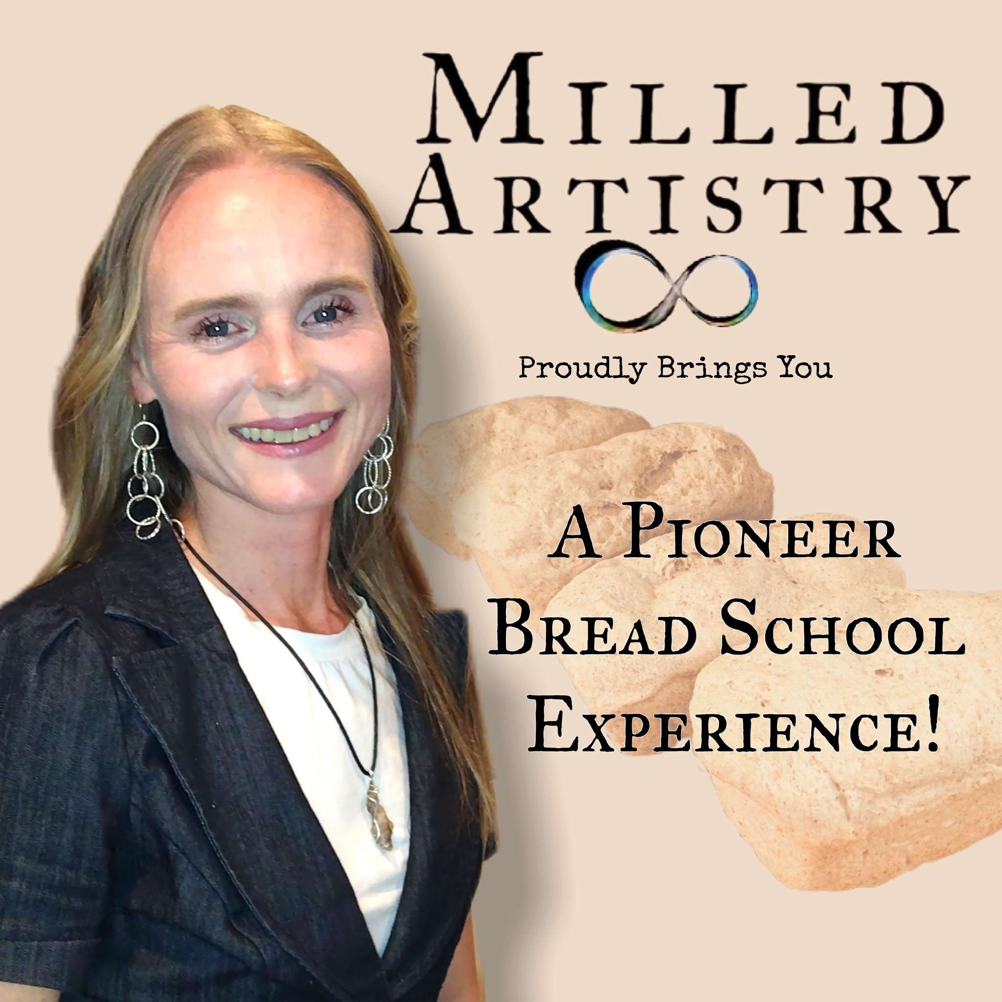 Smiling women with jewelry and business coat on. 4 faded loaves of bread in background