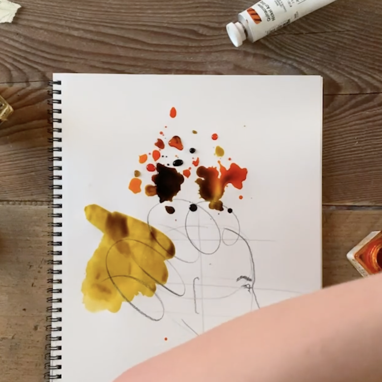 Liquid watercolours blending freely together